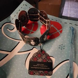 Large gunmetal bracelet with white milky stones.